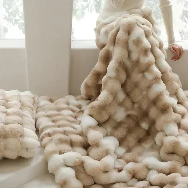 "Ultra-soft faux fur throw blanket, plush texture, beige cream tones, cozy decoration for sofa or bed."