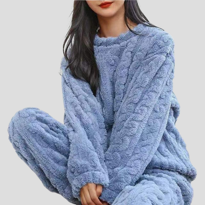 Ultra-soft women's fleece pajama set for cozy loungewear and warm winter sleep.