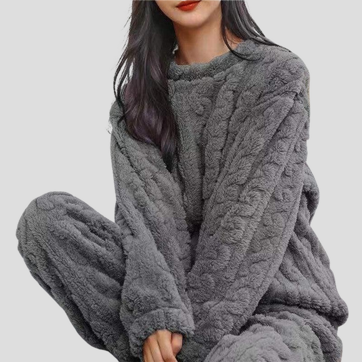 Comfortable fleece pajama set for women, perfect for warm sleepwear or cozy home loungewear.
