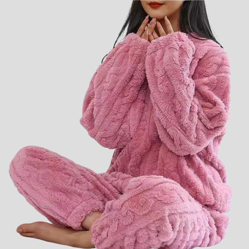 Warm & cozy women's fleece pajama set. Ultra-soft loungewear for comfortable sleepwear and home relaxation.