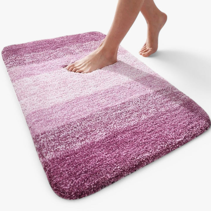 UltraAbsorb non-slip bathroom mat for floor safety, quick-drying microfiber bath rug for shower exit.