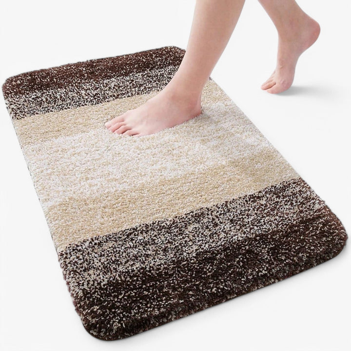 Close-up of UltraAbsorb microfiber bathroom mat texture, highly absorbent & soft, enhances home decor.