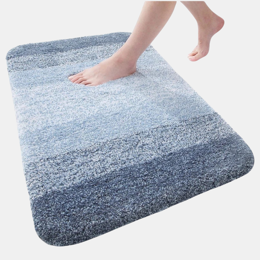 Modern non-slip UltraAbsorb bath mat in a stylish bathroom, ensures floor safety & dry comfort.