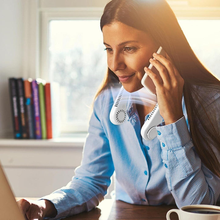 Unisex 5-speed bladeless neck cooling fan in headphone style, offering portable, hands-free, 360-degree airflow comfort.