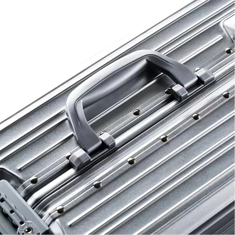 Sleek aluminum magnesium business suitcase. Durable hardshell carry-on for professional travel.