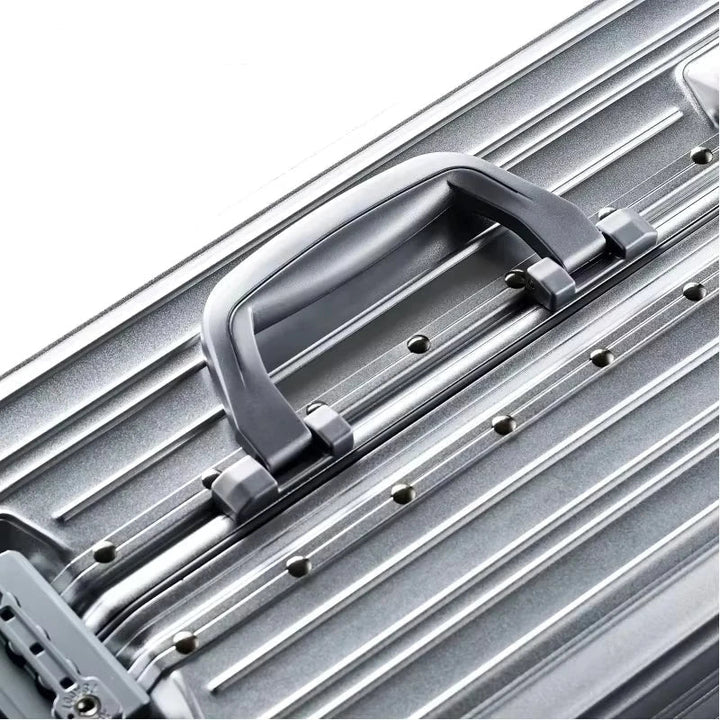Sleek aluminum magnesium business suitcase. Durable hardshell carry-on for professional travel.