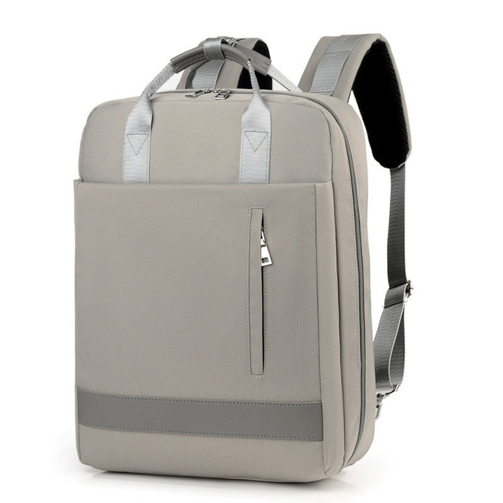 View of the anti-theft commuter backpack featuring an integrated USB charging port for devices on the go.
