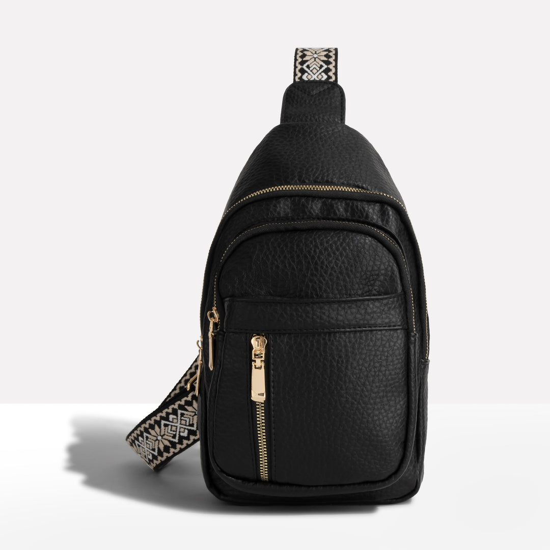 Unisex anti-theft crossbody bag in black nylon, featuring RFID blocking & slash resistance for secure travel.