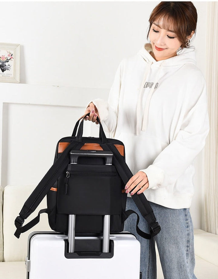 Streamlined anti-theft backpack for travel & daily use. Water-resistant and secure Oxford design.