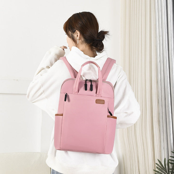 Durable anti-theft travel backpack. Water-resistant Oxford fabric, lightweight & secure for daily use.