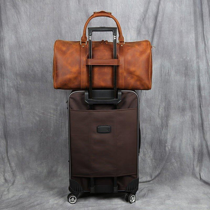 Sleek black compact travel wardrobe luggage, a carry-on solution for modern travelers.