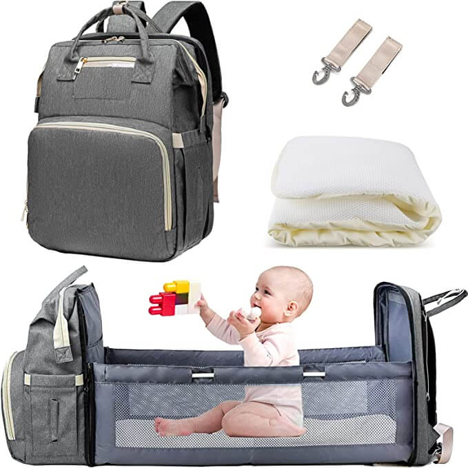 Foldable bassinet feature of the baby diaper bag unfolded, providing a safe sleep space for infants.