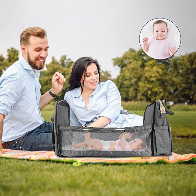 Interior view of the multi-pocket baby backpack, organized with baby essentials for easy access.