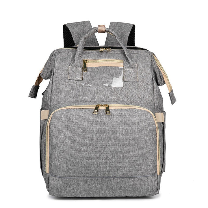 Side view of the spacious nappy backpack, demonstrating its capacity for all baby travel essentials.