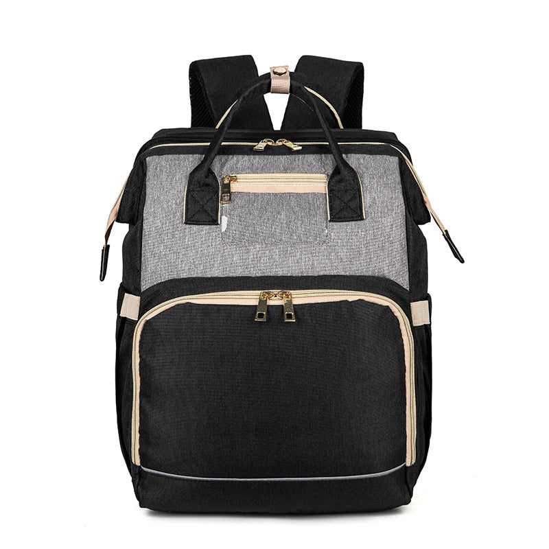 Detail of the ergonomic straps on the convertible baby bag, ensuring comfort for parents while traveling.