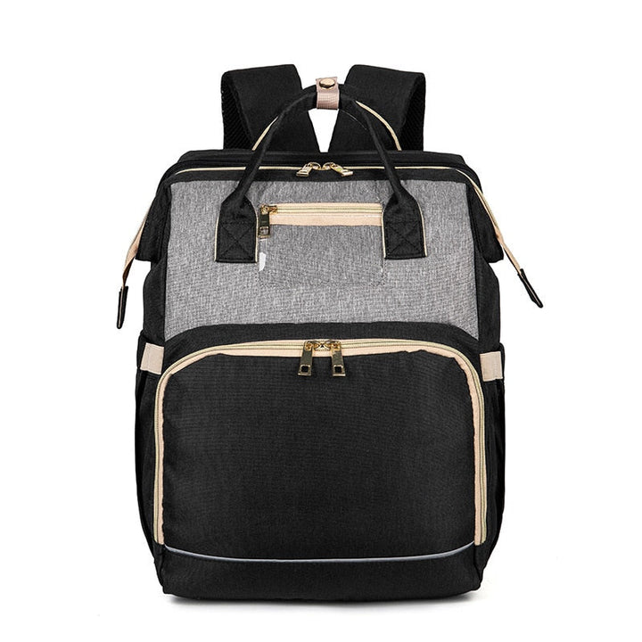 Detail of the ergonomic straps on the convertible baby bag, ensuring comfort for parents while traveling.