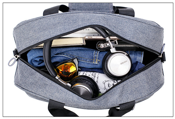 Durable unisex travel bag, converts to backpack. Carry-on luggage meets airline size limits, water-resistant.