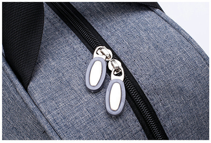 Front view of sleek unisex convertible carry-on luggage bag. Water-resistant fabric, ideal for travel.