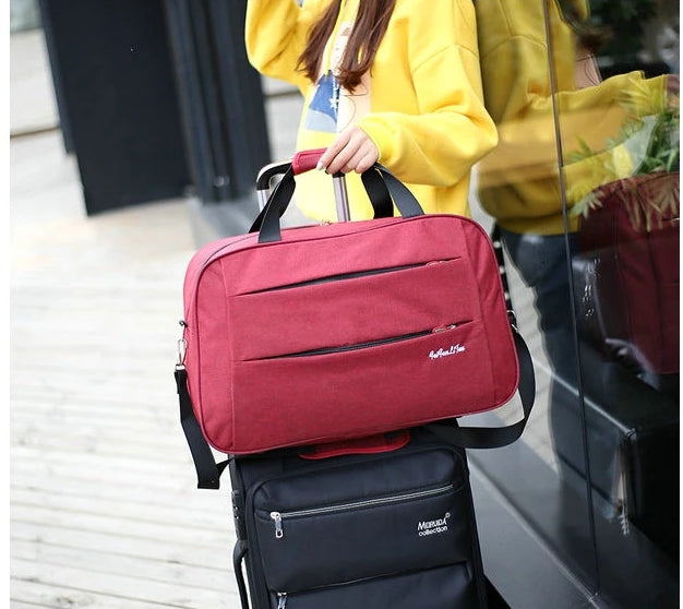 Versatile unisex duffel carry-on luggage. Easy to pack, water-resistant for all types of travel.