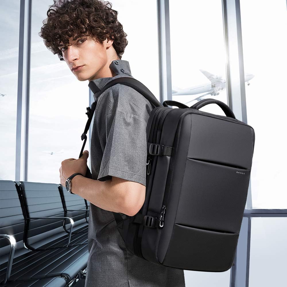 Expandable 26-45L travel backpack, ideal for organized business travel. Waterproof & laptop sleeve.