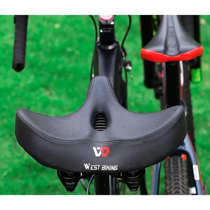 Shock absorbing bicycle saddle, extra wide & padded for unisex comfort on any cycling adventure.