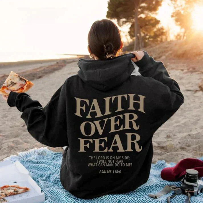 Comfortable unisex 'Faith Over Fear' hoodie. Casual Christian apparel featuring Psalm 118:6 inspirational text.