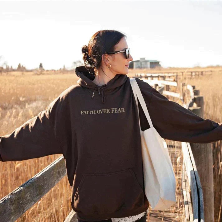 Inspirational 'Faith Over Fear' unisex hoodie. Religious apparel with Psalm 118:6 scripture for daily encouragement.