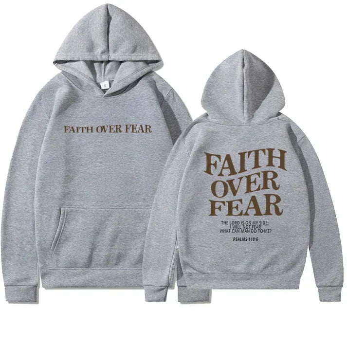 Versatile unisex 'Faith Over Fear' hoodie. Christian apparel featuring Psalm 118:6 for inspirational casual style.