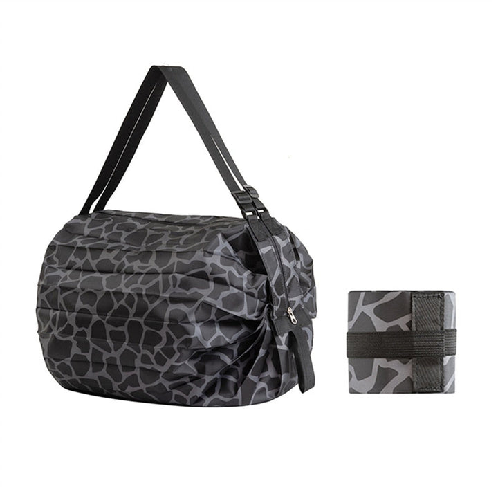 Large capacity reusable shopping tote bag, foldable for convenience. Durable oxford fabric, ideal for groceries.