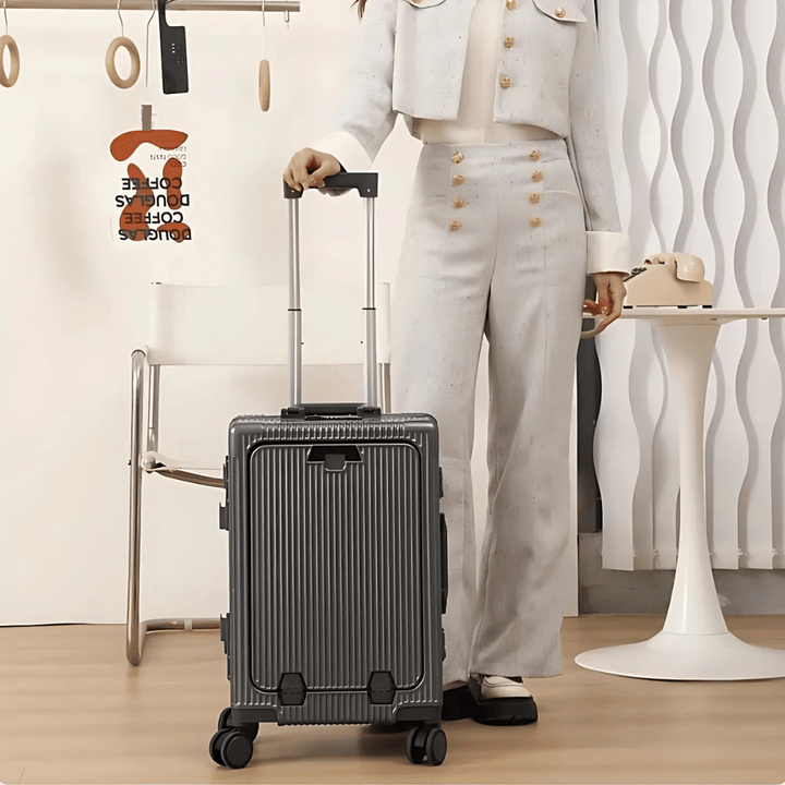 Hardshell carry-on suitcase, Manhattan Pro, with spinner wheels & front pocket for short trips.
