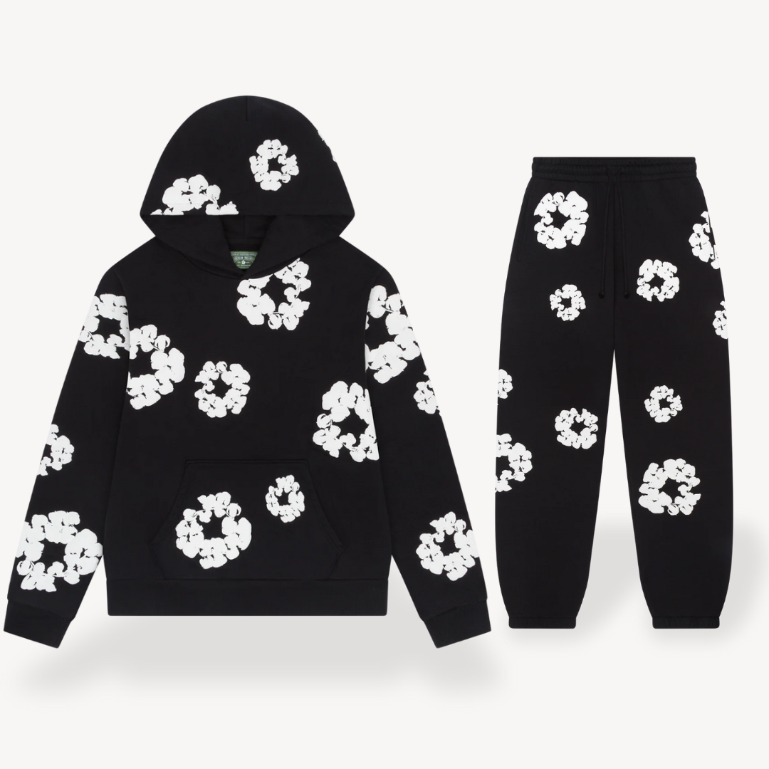 Unisex hoodie with bold white floral graphics on black cotton, combines style and comfort for a standout look.