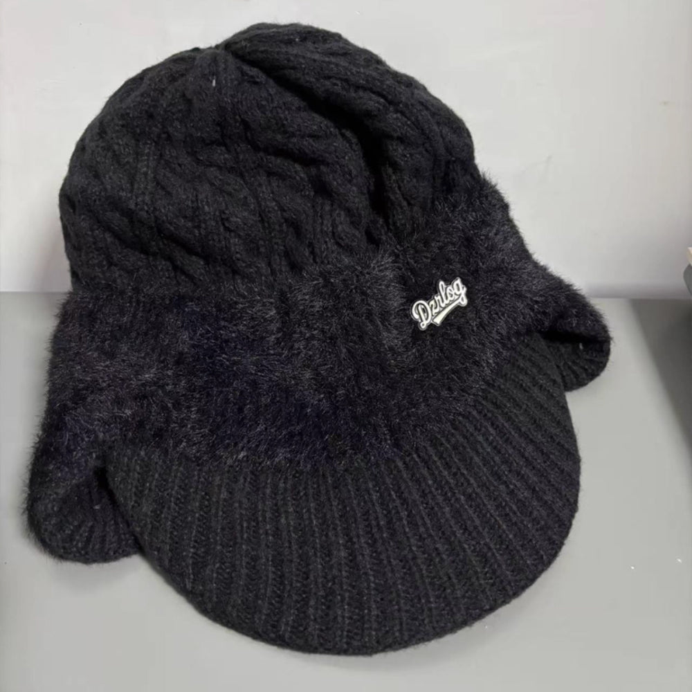 Unisex winter beanie cap, trapper design, with full ear coverage for snow activities.
