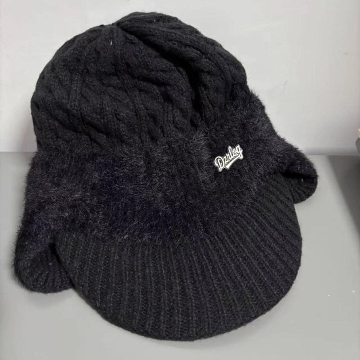 Unisex winter beanie cap, trapper design, with full ear coverage for snow activities.
