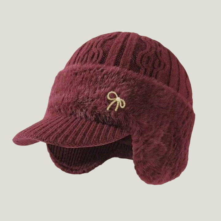 Comfortable unisex winter knit cap, trapper design, with warm ear flaps & chin tie.