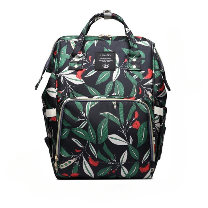 Stylish unisex large-capacity multi-pocket diaper backpack. Waterproof travel bag for modern parents on the go.