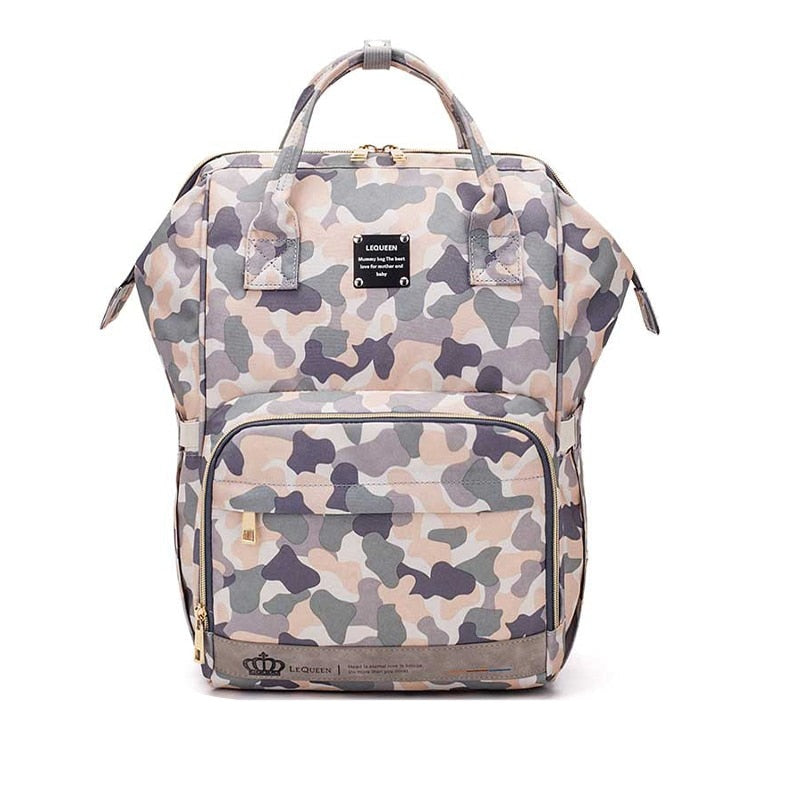 New mom's unisex large diaper backpack with multiple pockets. Waterproof travel bag for baby essentials & organization.