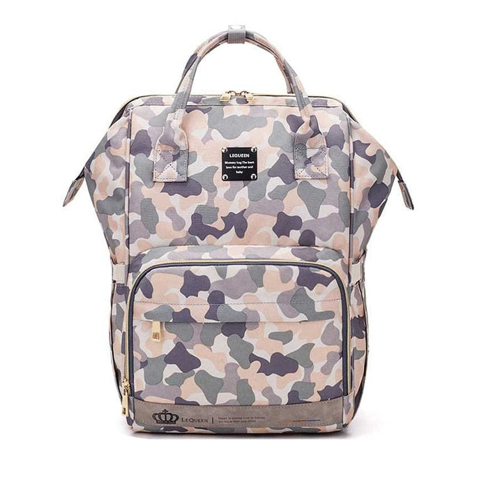 New mom's unisex large diaper backpack with multiple pockets. Waterproof travel bag for baby essentials & organization.