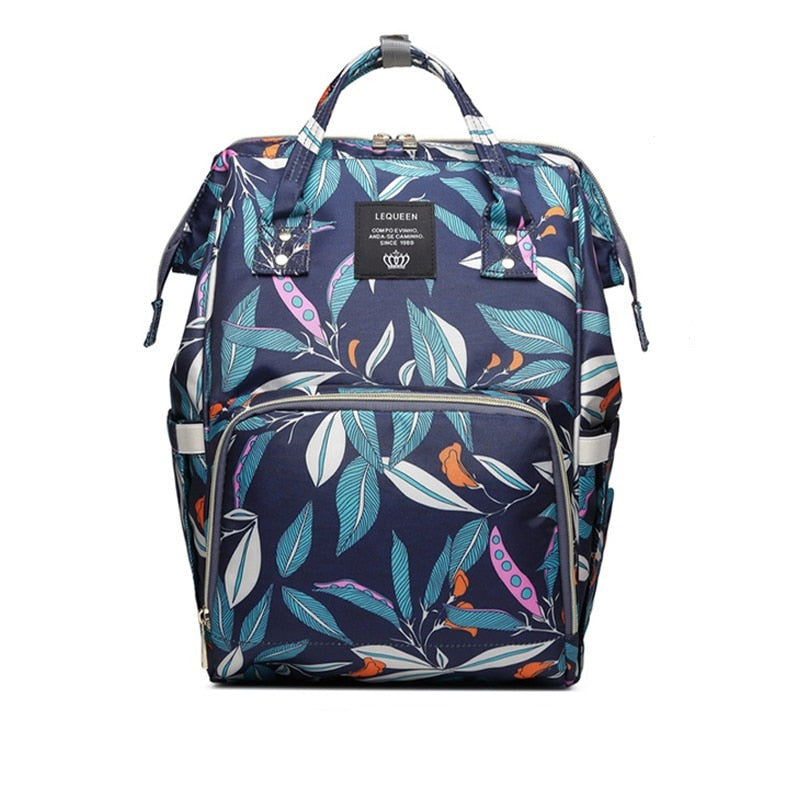 Spacious multi-pocket unisex diaper backpack, waterproof travel bag for all baby essentials & parent organization.