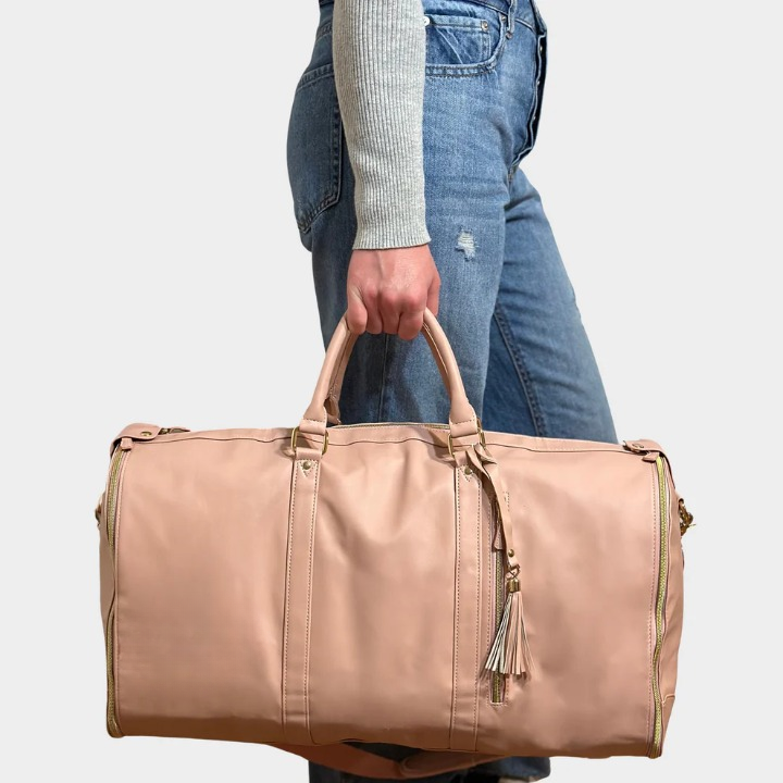 Compact duffel carry-on travel bag. Unisex vegan leather weekend bag, great for organized business trips.