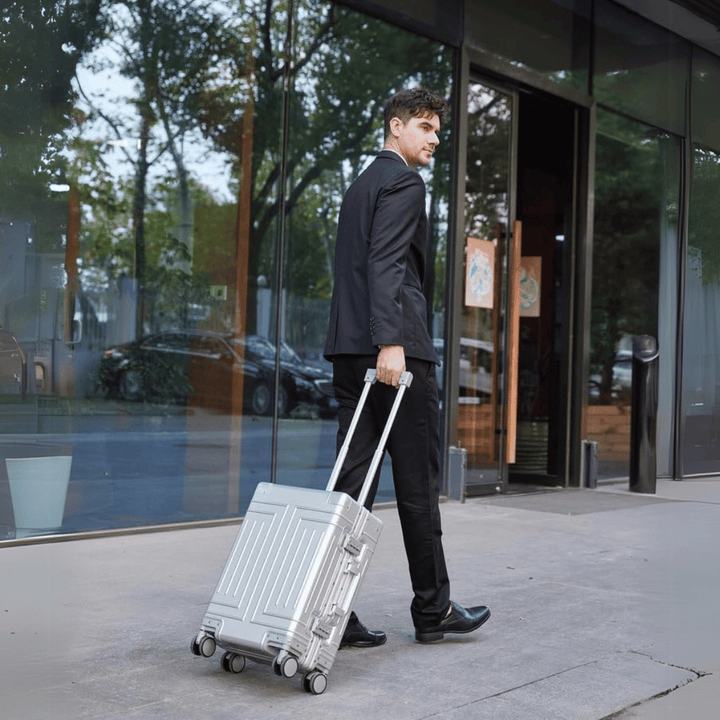 Stylish hard shell carry-on luggage with smooth spinner wheels for unisex secure travel.