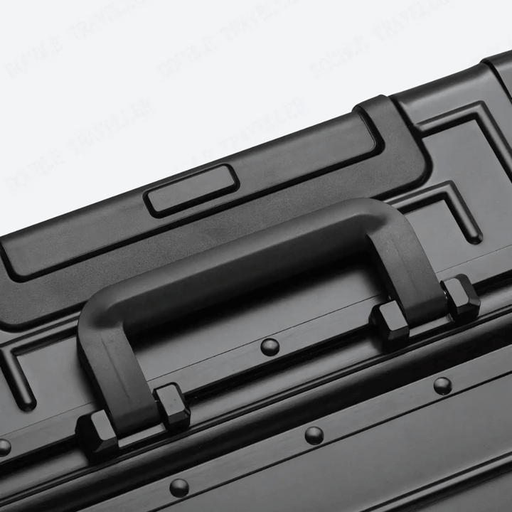Unisex Emperor hard shell suitcase, secure, lightweight aluminum for business & vacation trips.