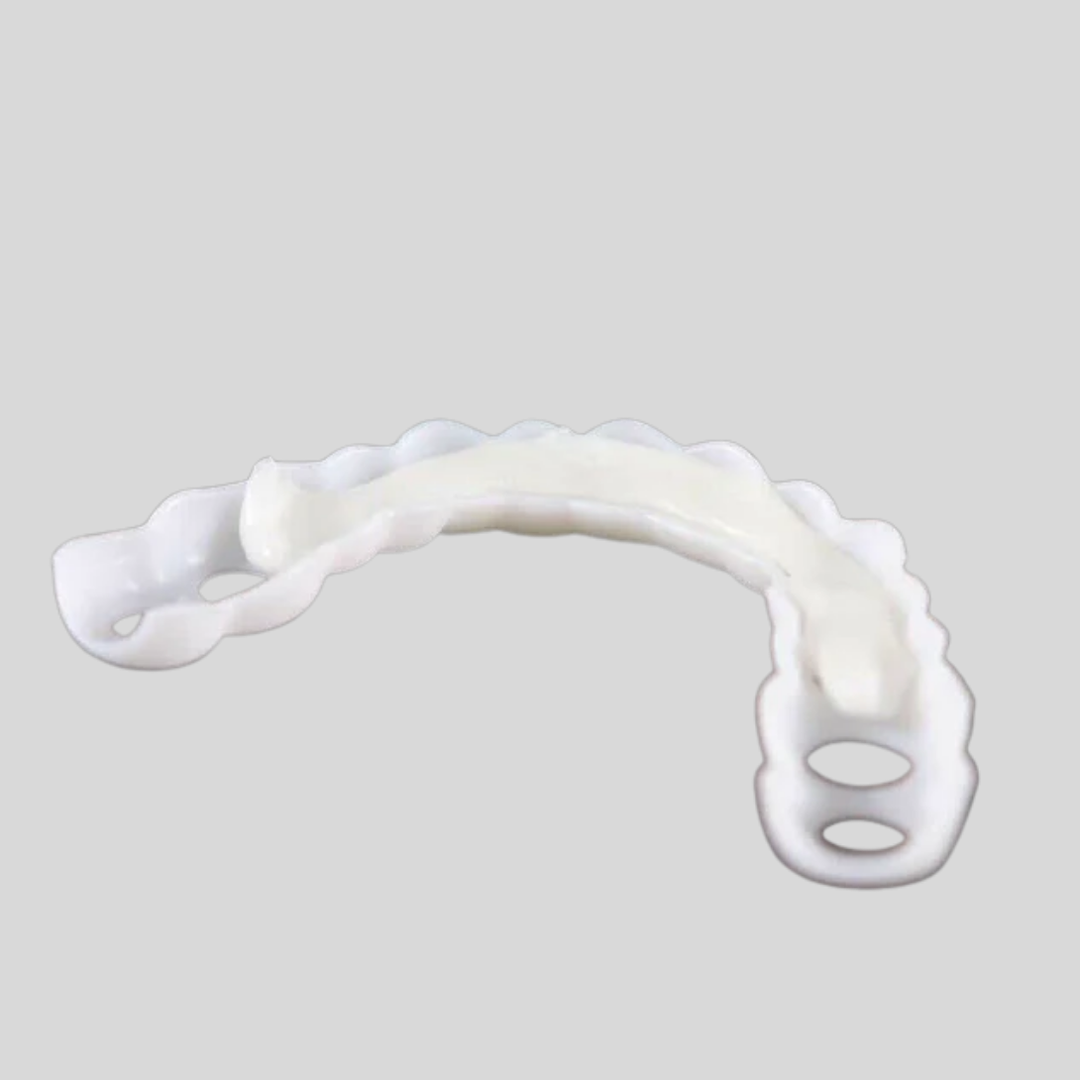 Close-up of flexible snap-on smile veneers. Instant, temporary dental solution for brighter, confident teeth.