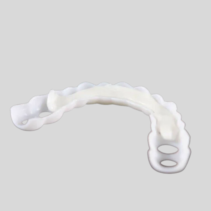 Close-up of flexible snap-on smile veneers. Instant, temporary dental solution for brighter, confident teeth.