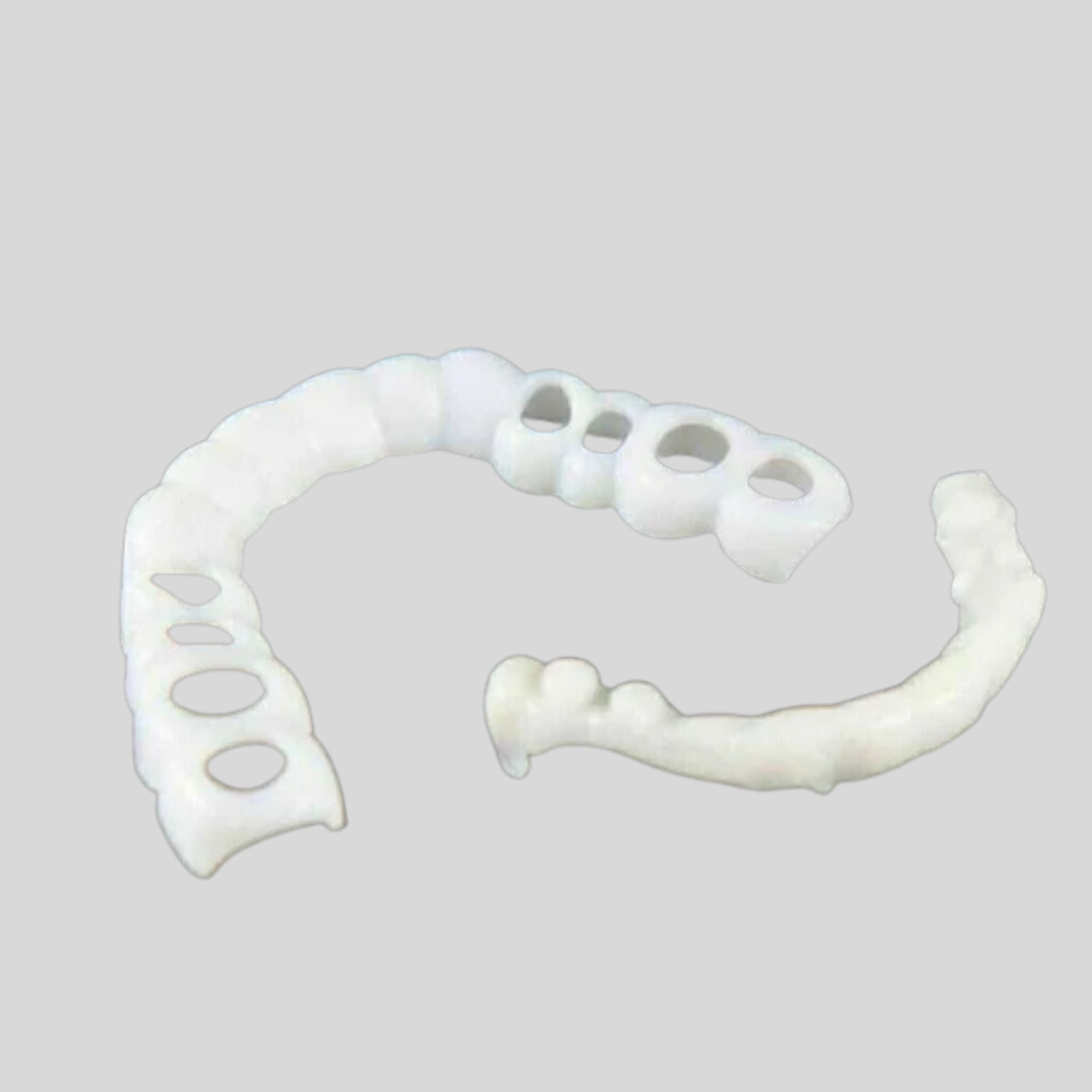 Model smiling with unisex snap-on veneers, enhancing teeth for an instant confidence boost & beautiful smile.