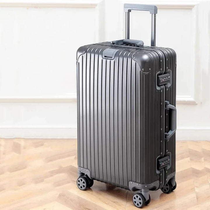 Unisex Tirana Aluminium-Magnesium hard shell travel luggage with spinner wheels for durable protection.