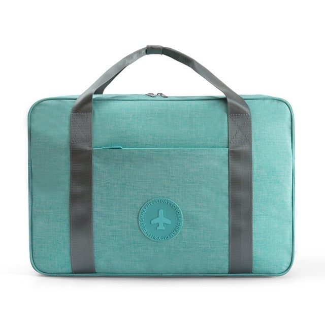 Portable unisex carry-on suitcase, lightweight & convenient for all your travel needs.