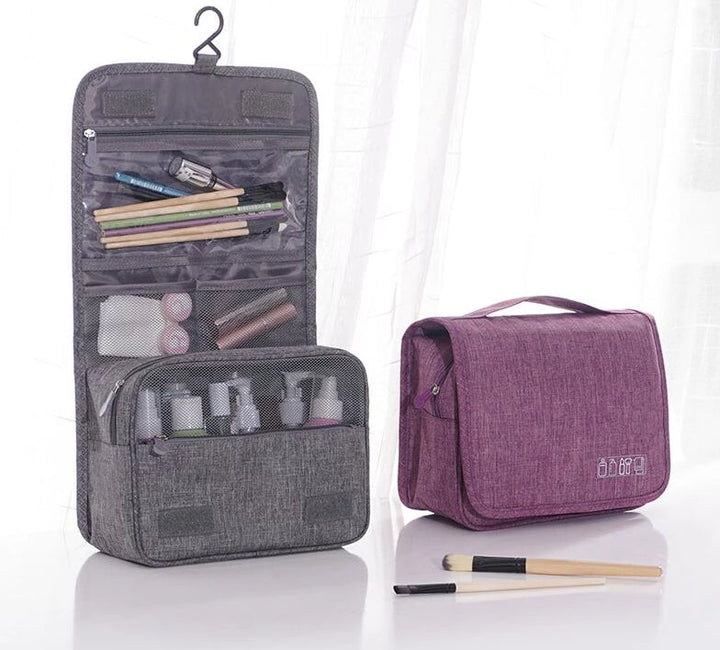 Unisex travel hanging toiletry bag organizer, waterproof, for cosmetics & personal items.