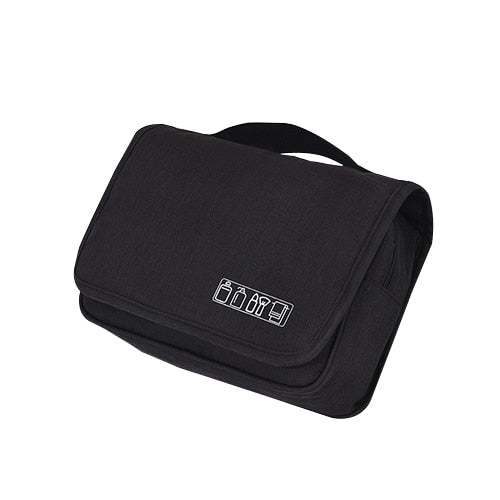 Spacious travel cosmetic organizer bag with multiple compartments for makeup and toiletries.