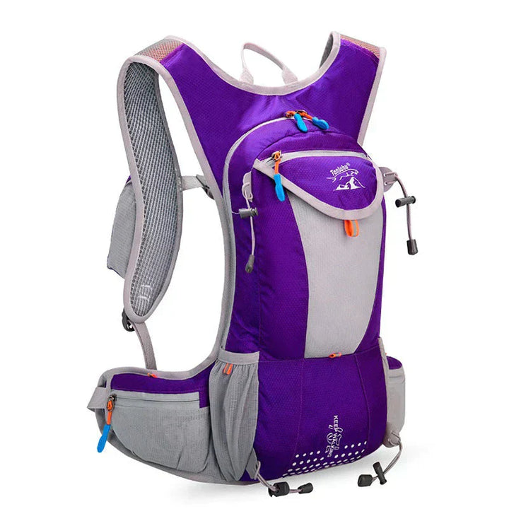 Hiker wearing a durable waterproof hydration pack on a scenic mountain trail.