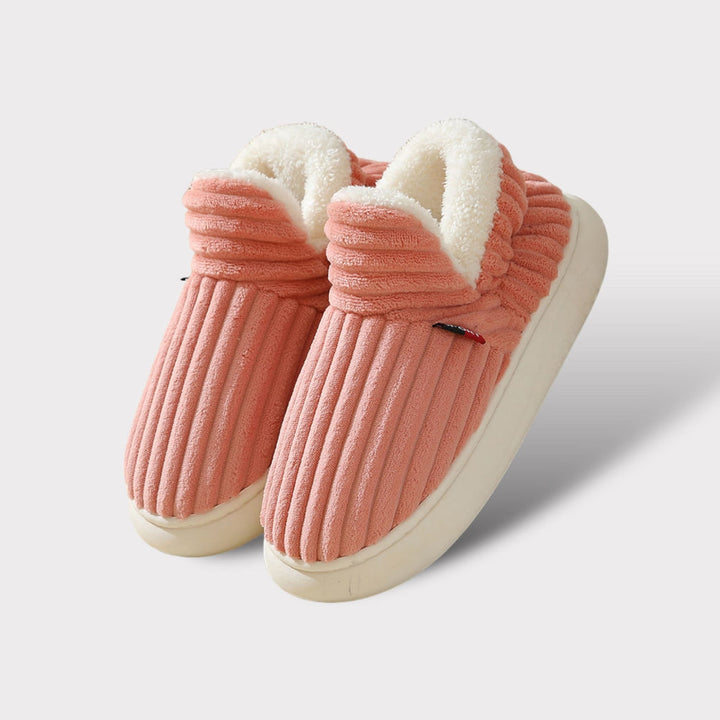 Plush unisex comfort slippers, ideal for warm winter relaxation. Ergonomic design & cozy lining, perfect gift idea.